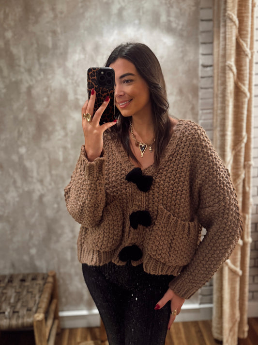 Casaco de malha grossa com textura e laços