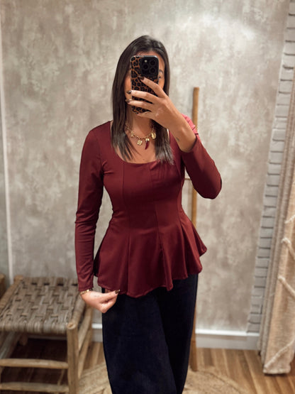 Blusa em lycra com efeito peplum