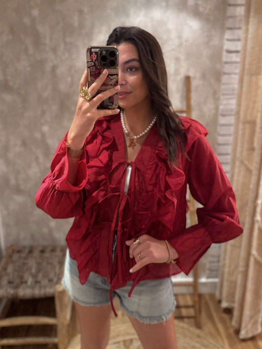 Blusa de seda transparente com atilhos e folhos