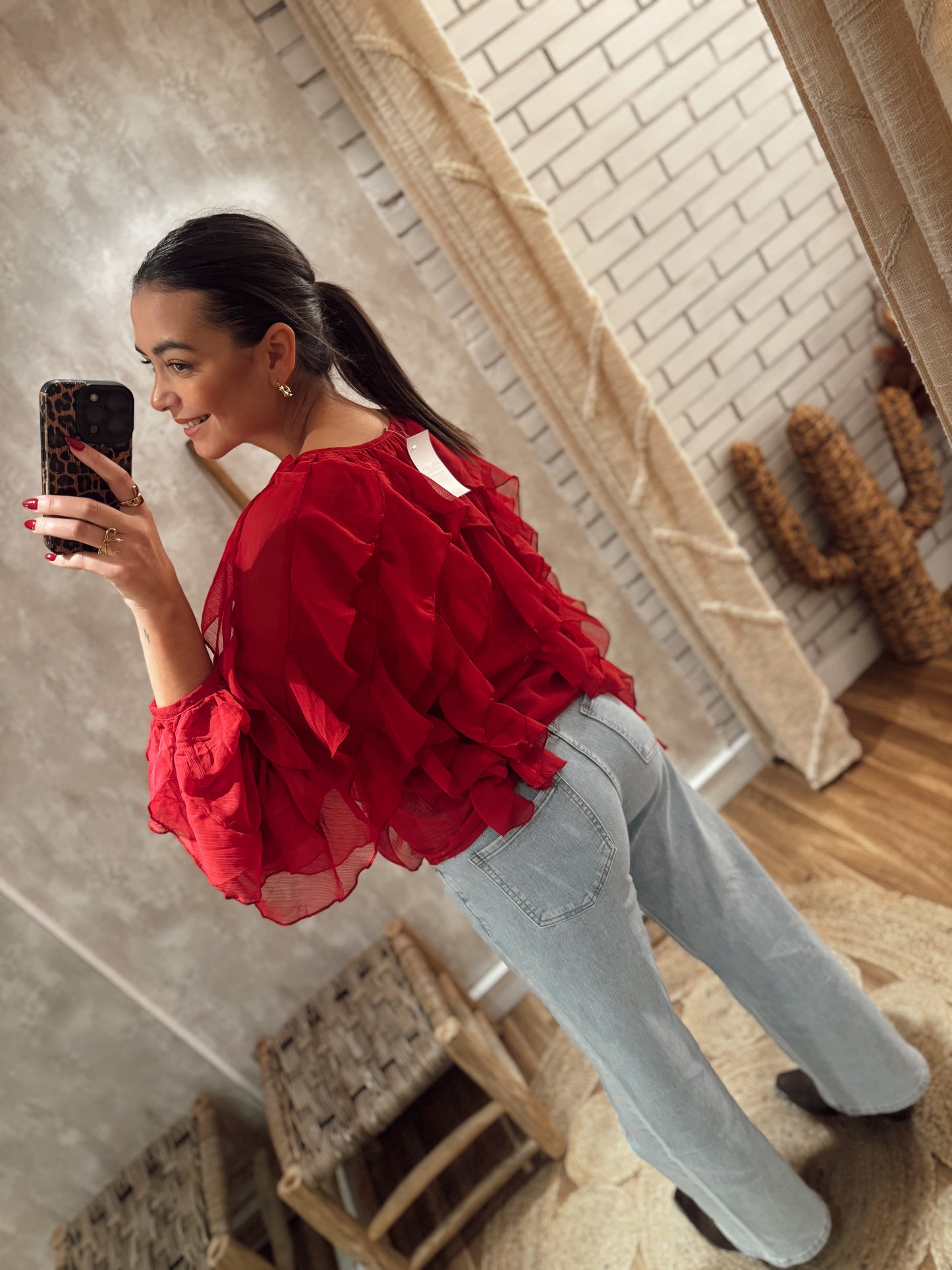 Jeans de ganga com laços bordados