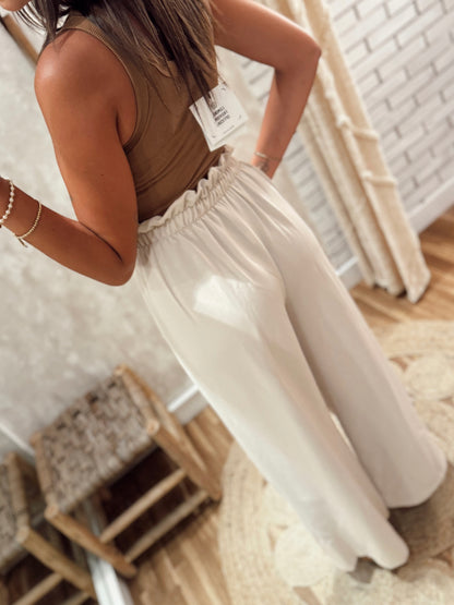 Pantalones fluidos de cintura alta