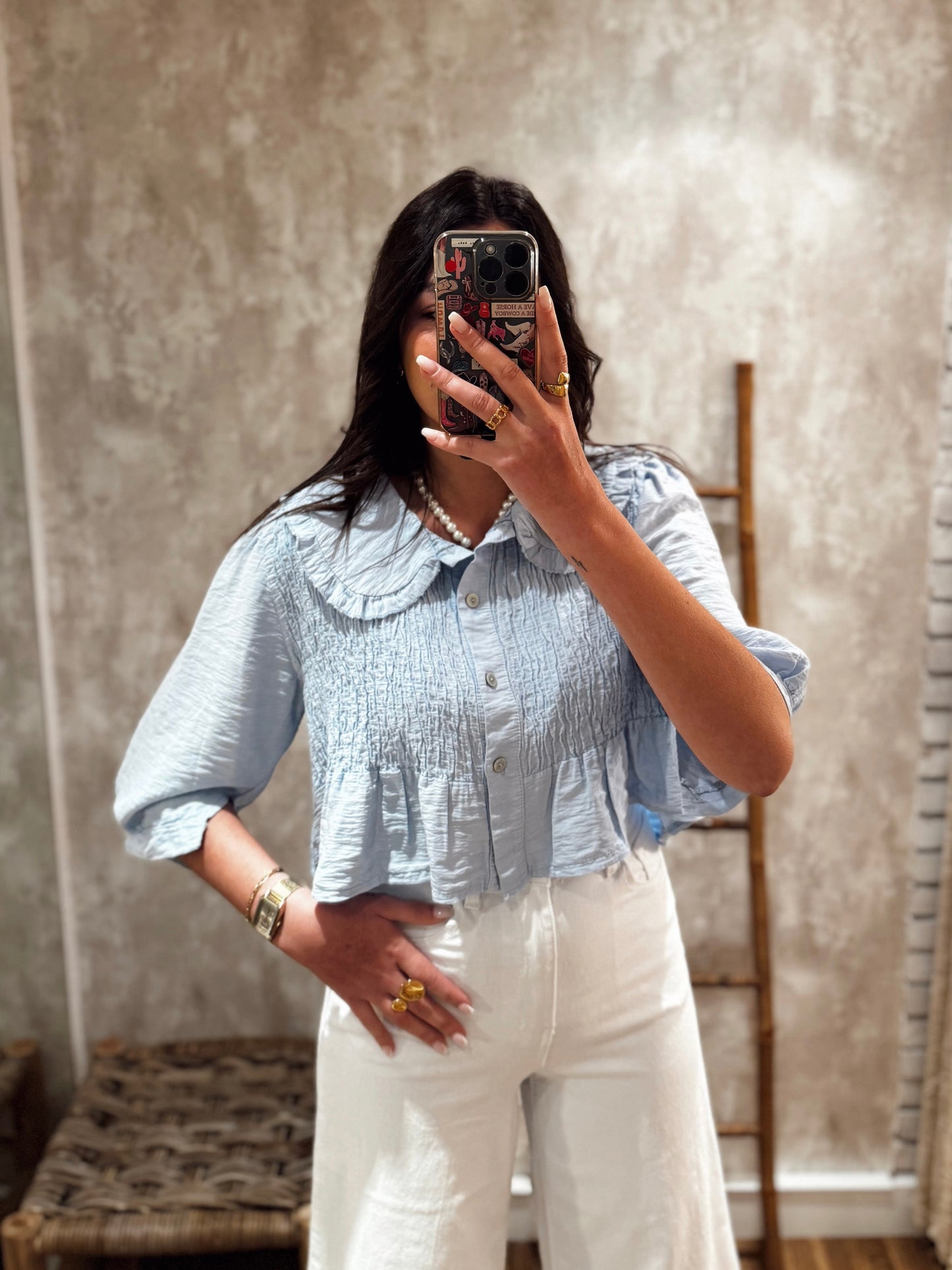Blusa con cuello babero