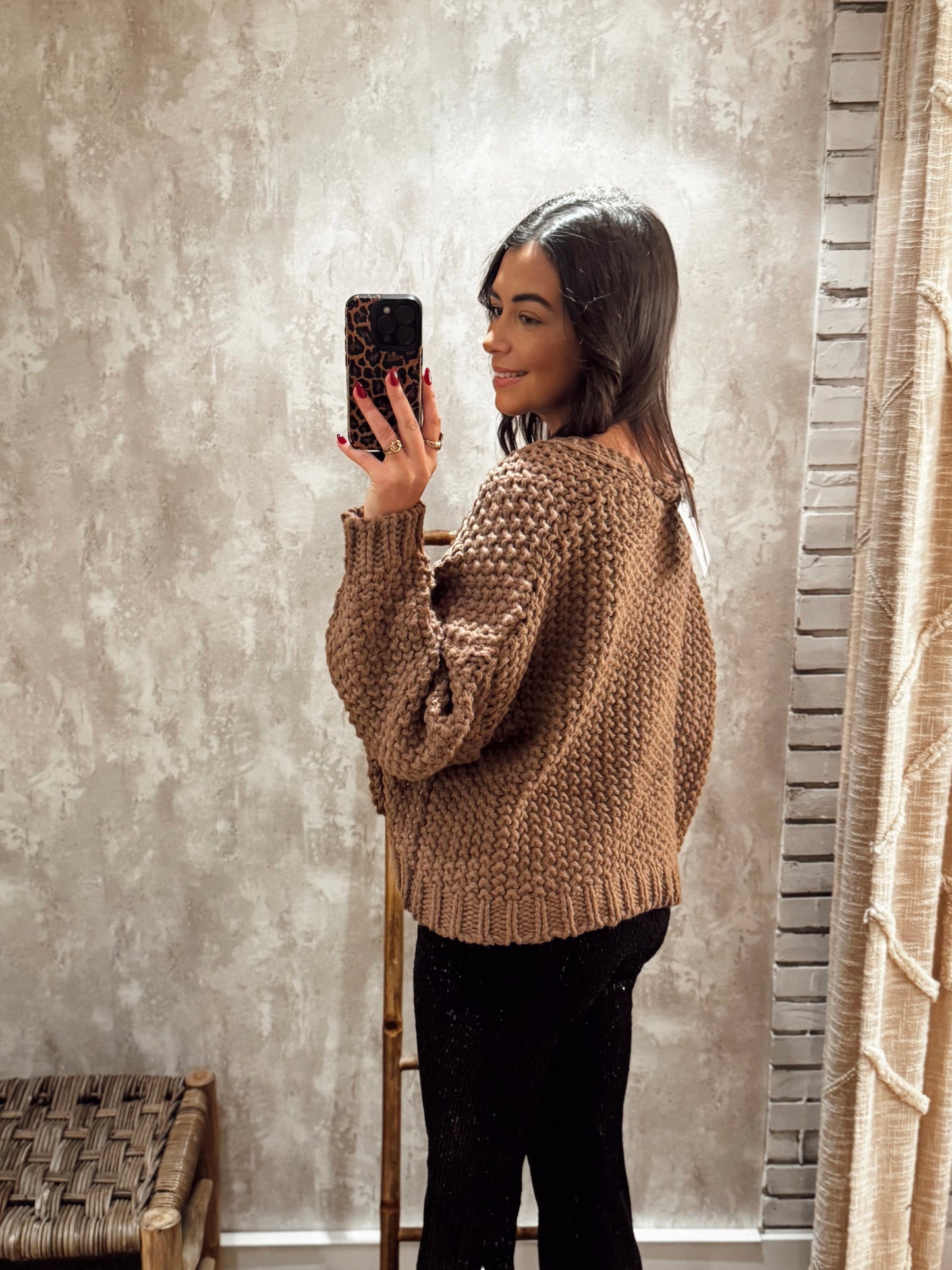 Casaco de malha grossa com textura e laços