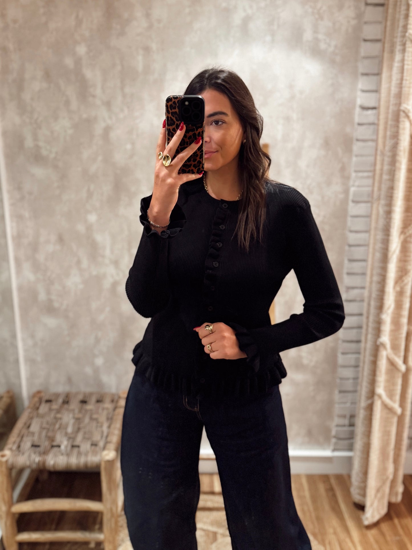 Casaco em malha canelada com folho