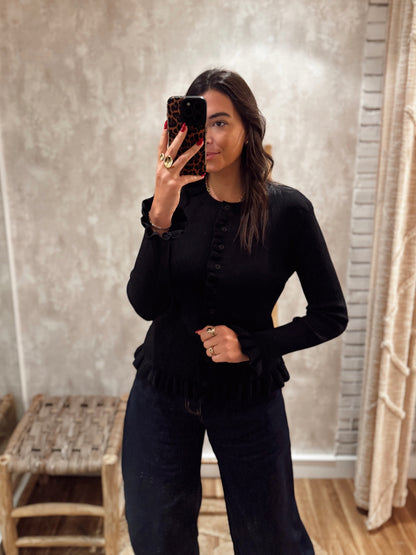 Casaco em malha canelada com folho