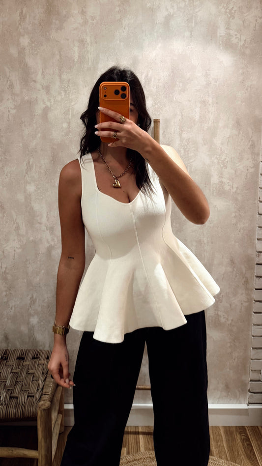 Top em malha c/efeito peplum