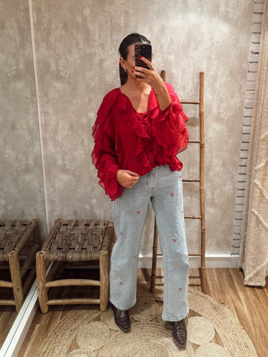 Jeans de ganga com laços bordados