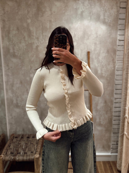 Casaco em malha canelada com folho