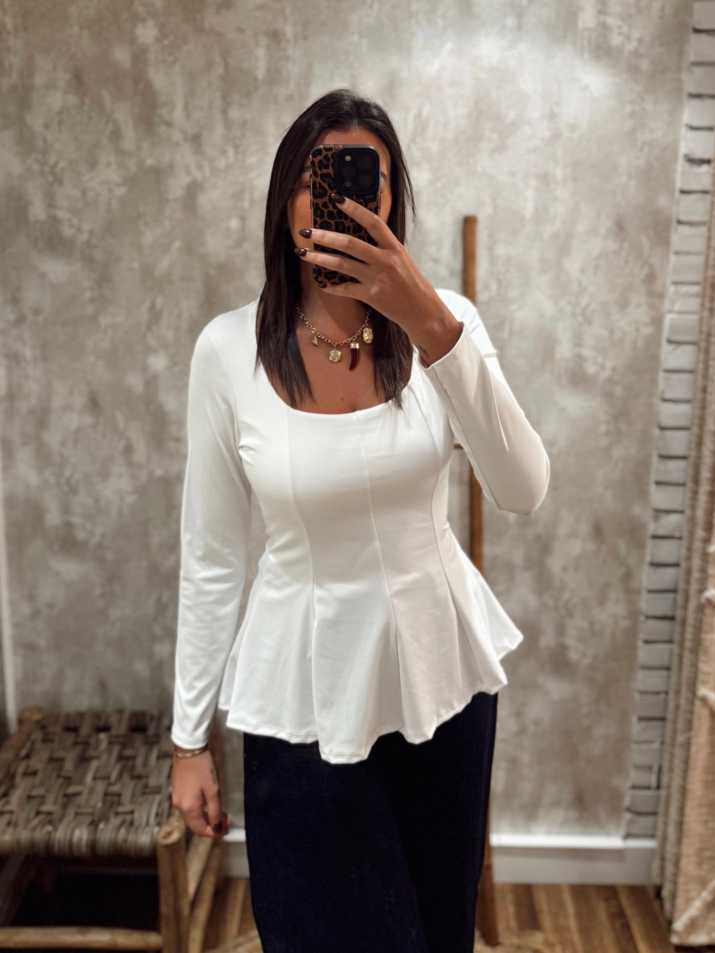 Blusa em lycra com efeito peplum