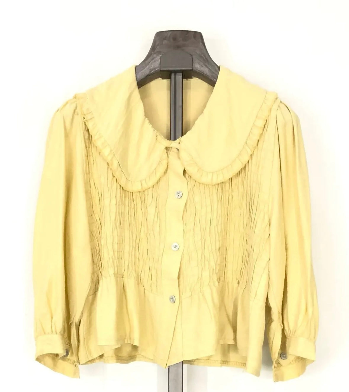 Blusa con cuello babero