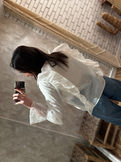 Blusa de seda transparente com atilhos e folhos