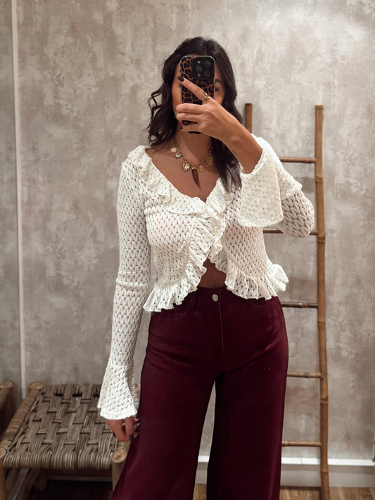 Blusa de malha rendada com folhos